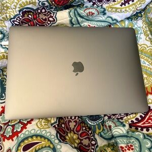 Apple MacBook Pro Silver 15 inch 2019 model with touch bar with charger included